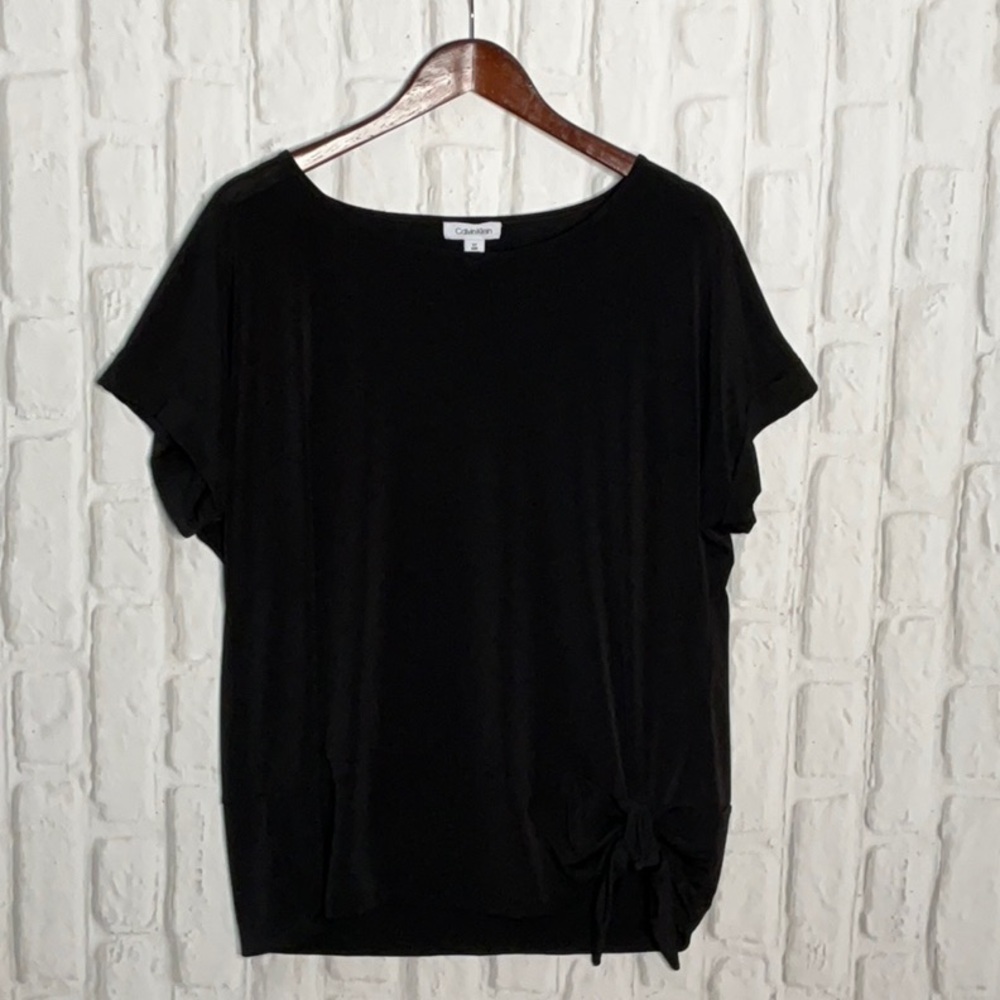 Calvin Klein black knit shirt with band and tie at bottom Women’s Large BX26